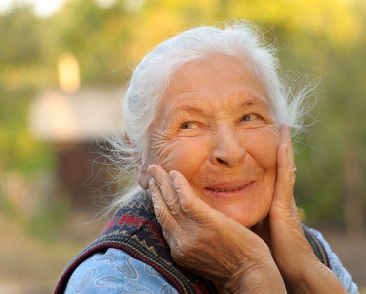 Portrait of the laughing elderly woman