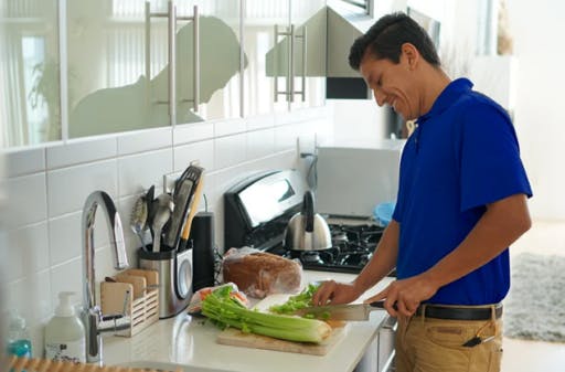 Caregiver Preparing Food