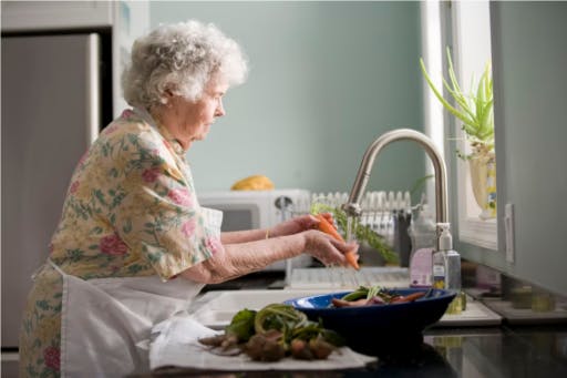 Senior Washing Dishes