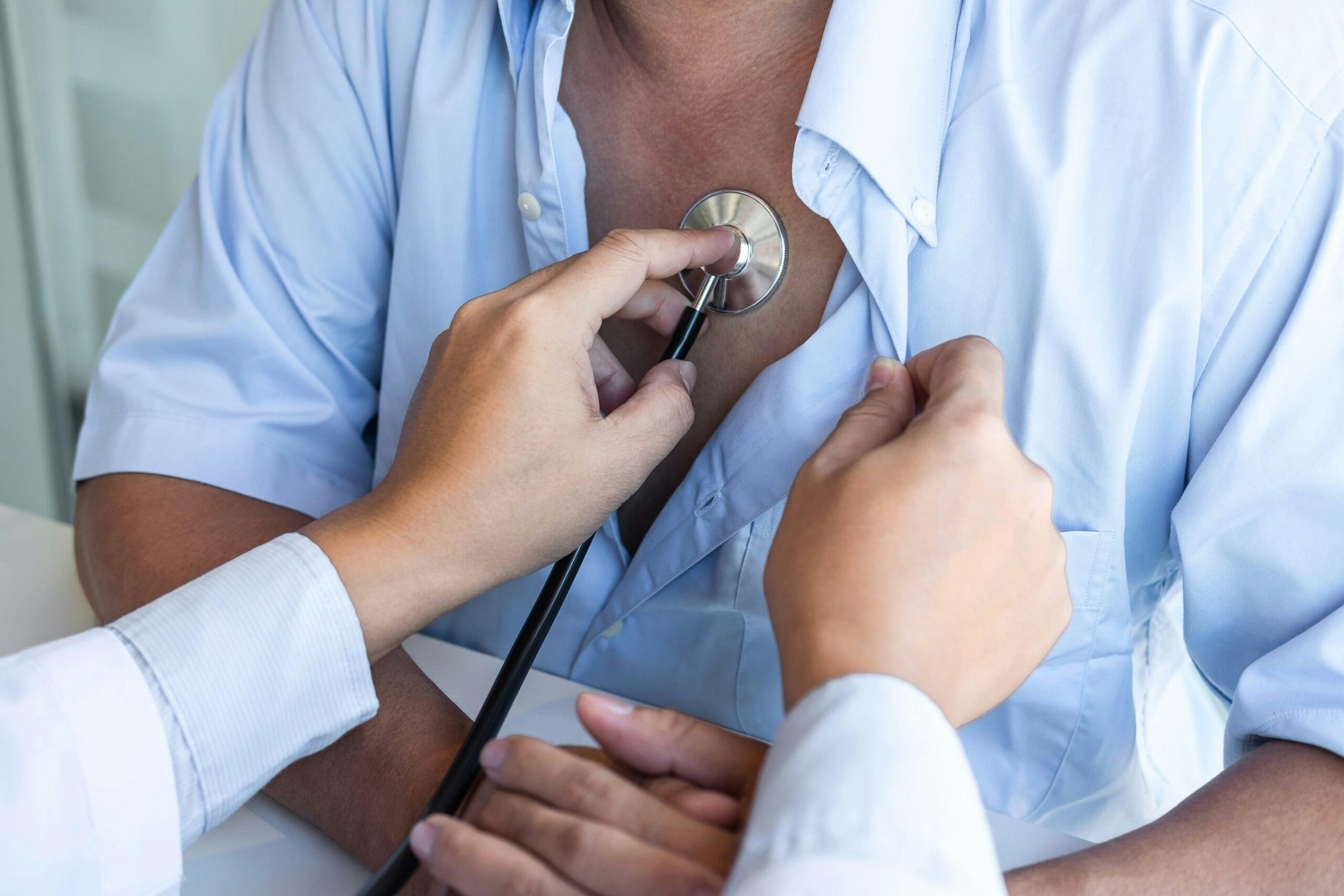 Doctor using stethoscope to listen checking Heart rate measuring
