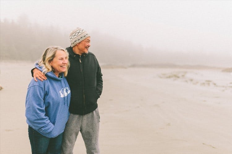 man-and-woman-smiling-with-foggy-background