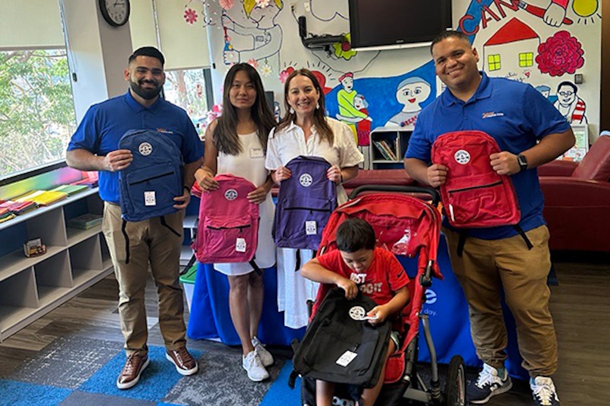24 Hour Home Care meets with a Southern California family to provide them with a backpack for their son at one of the local Wishpack events. 