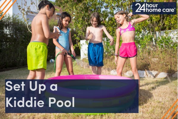 Image: Children playing in a kiddie pool.
