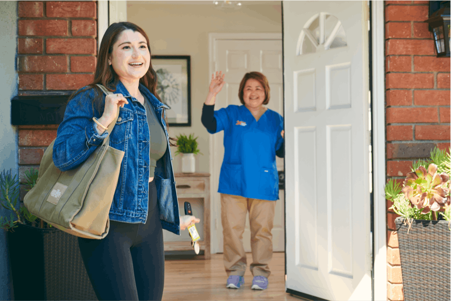 A caretaker seeing off a client