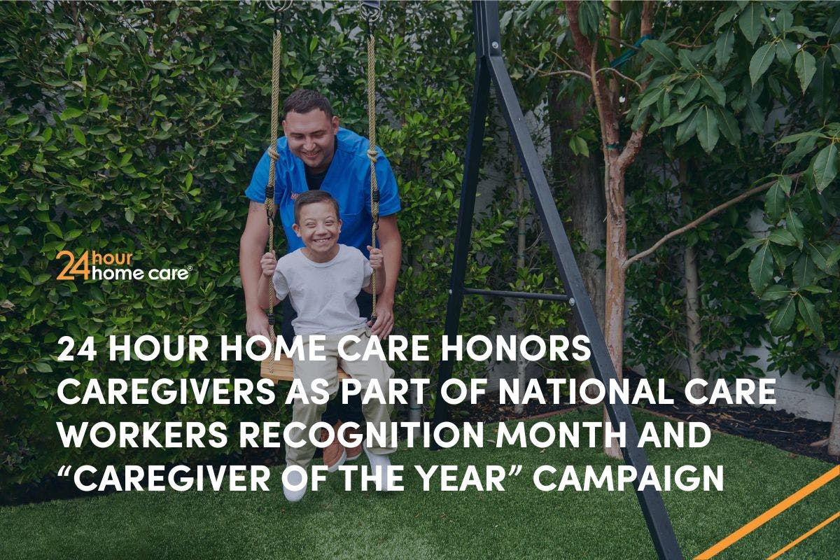 A caregiver pushes a child on a swing.