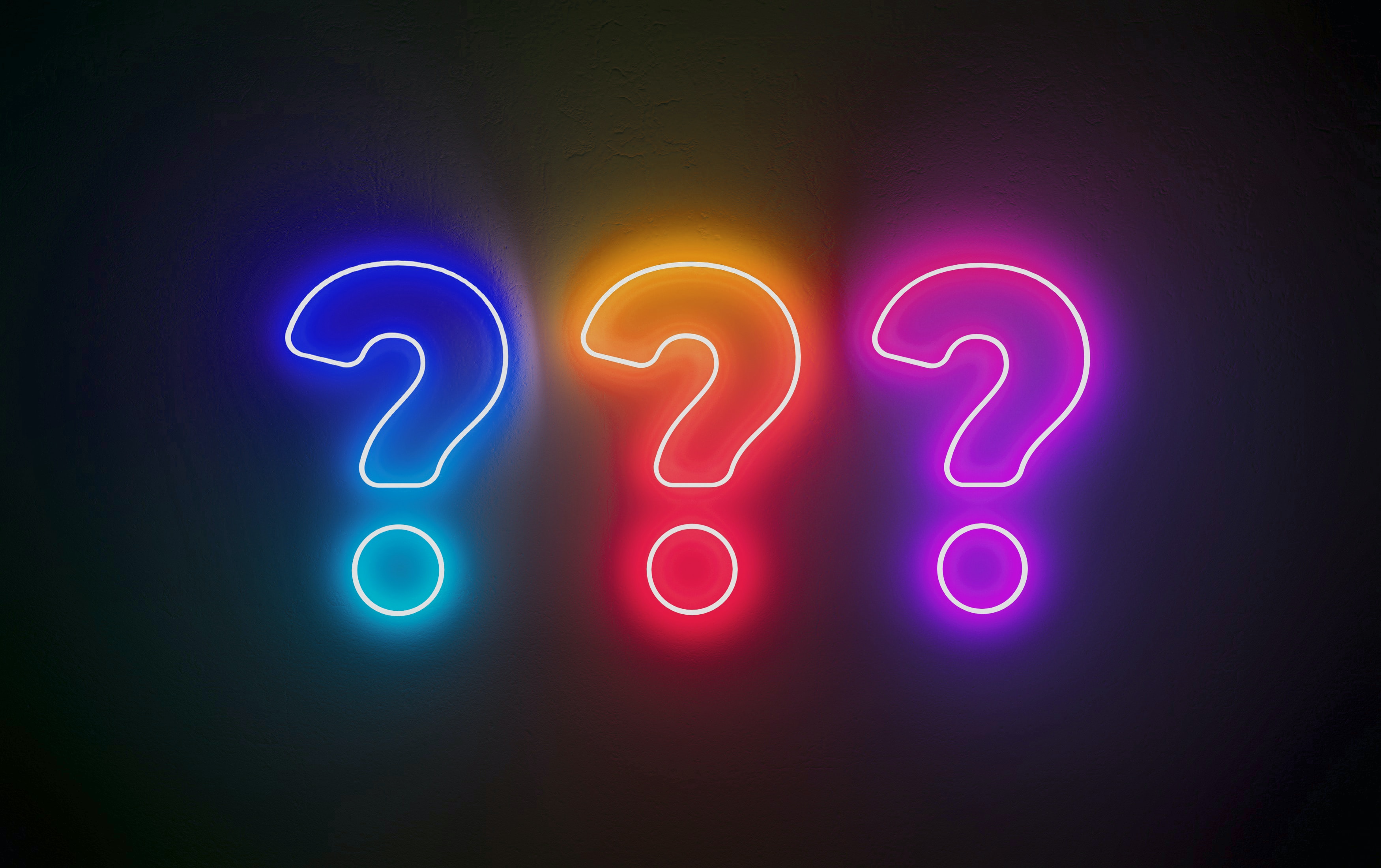 Question marks representing evaluating a sales enablement software