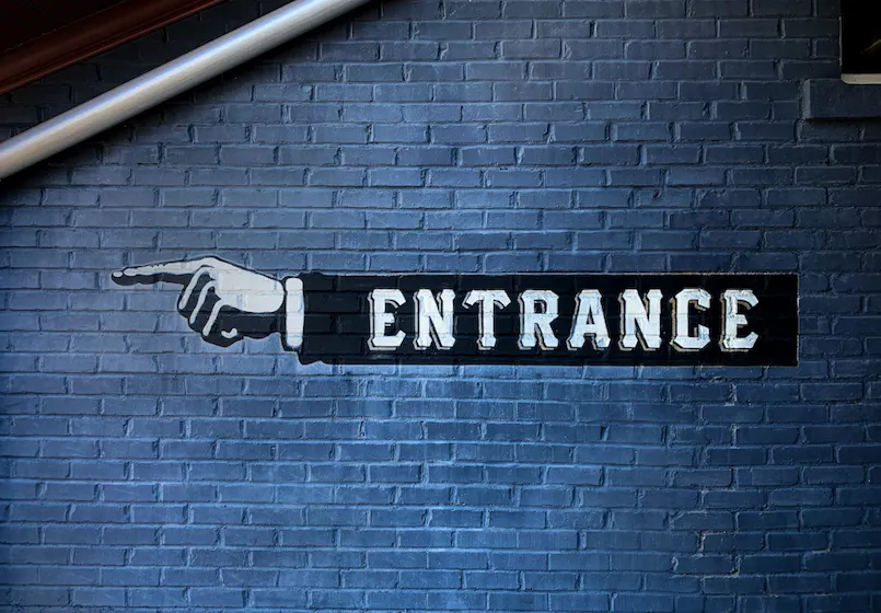 entrance sign representing new hires employee onboarding