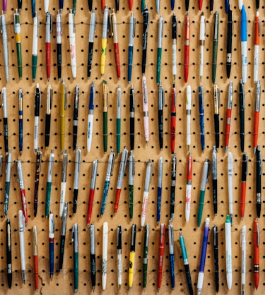 wall of pens representing learning content management system