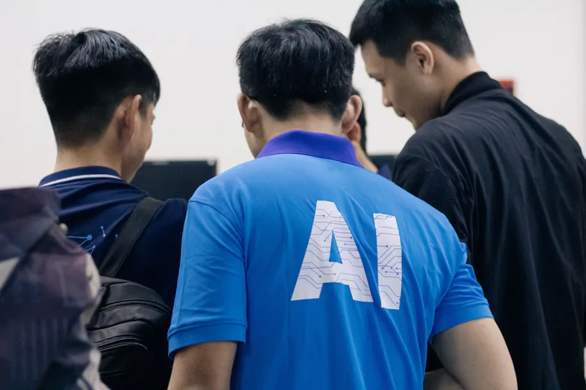 Man in blue tshirt representing AI