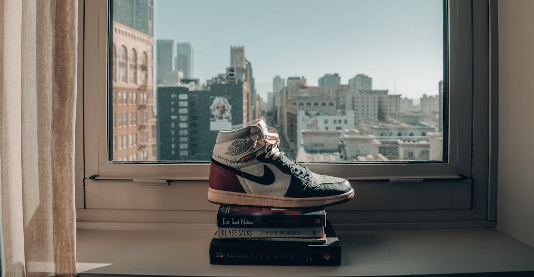 Shoe on books