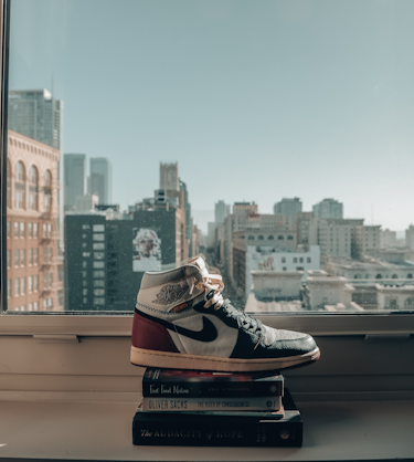 Shoe on books