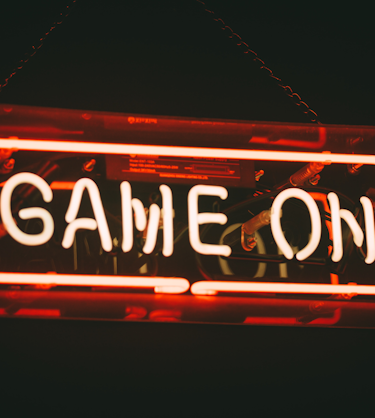 game on sign representing scaling a sales enablement team 