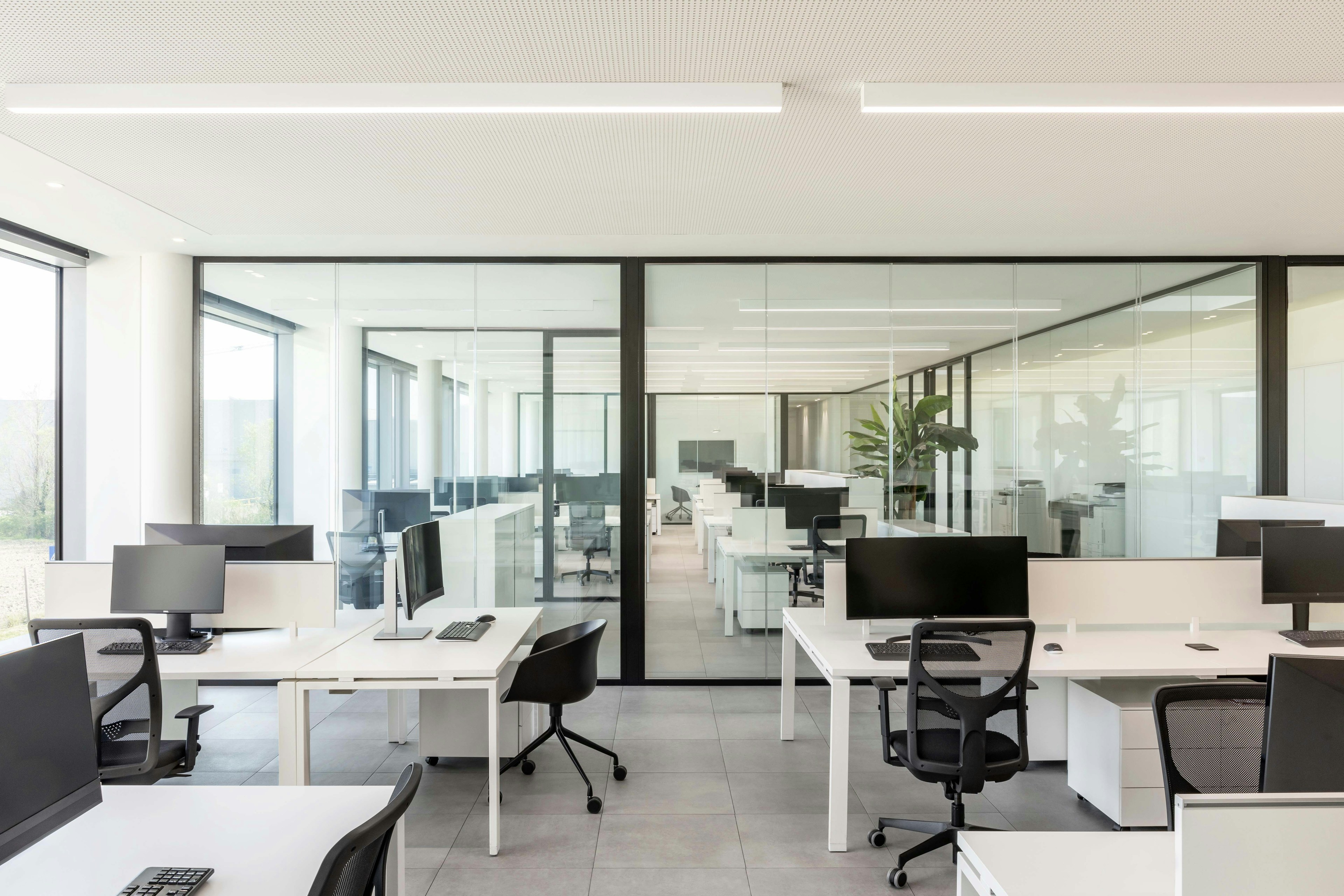 Interior of 3B offices with work desks and office computers