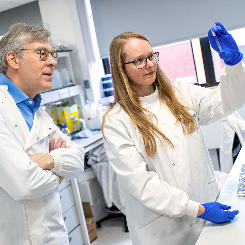 Two researchers working in a lab