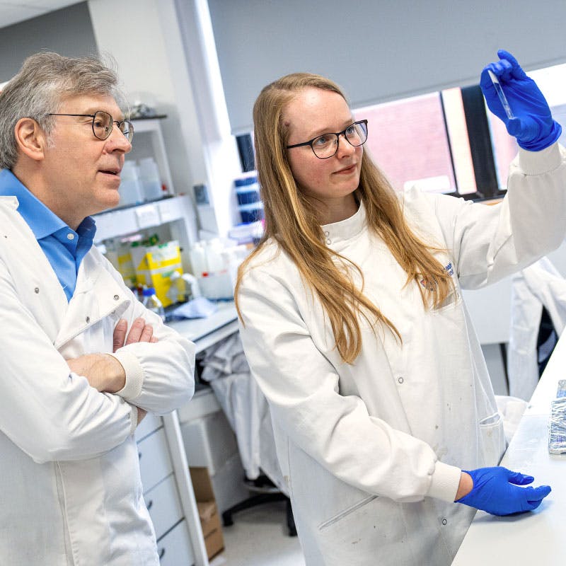 Two researchers working in a lab