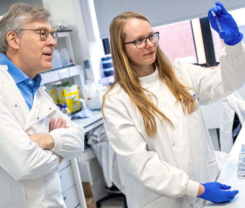 Two researchers working in a lab