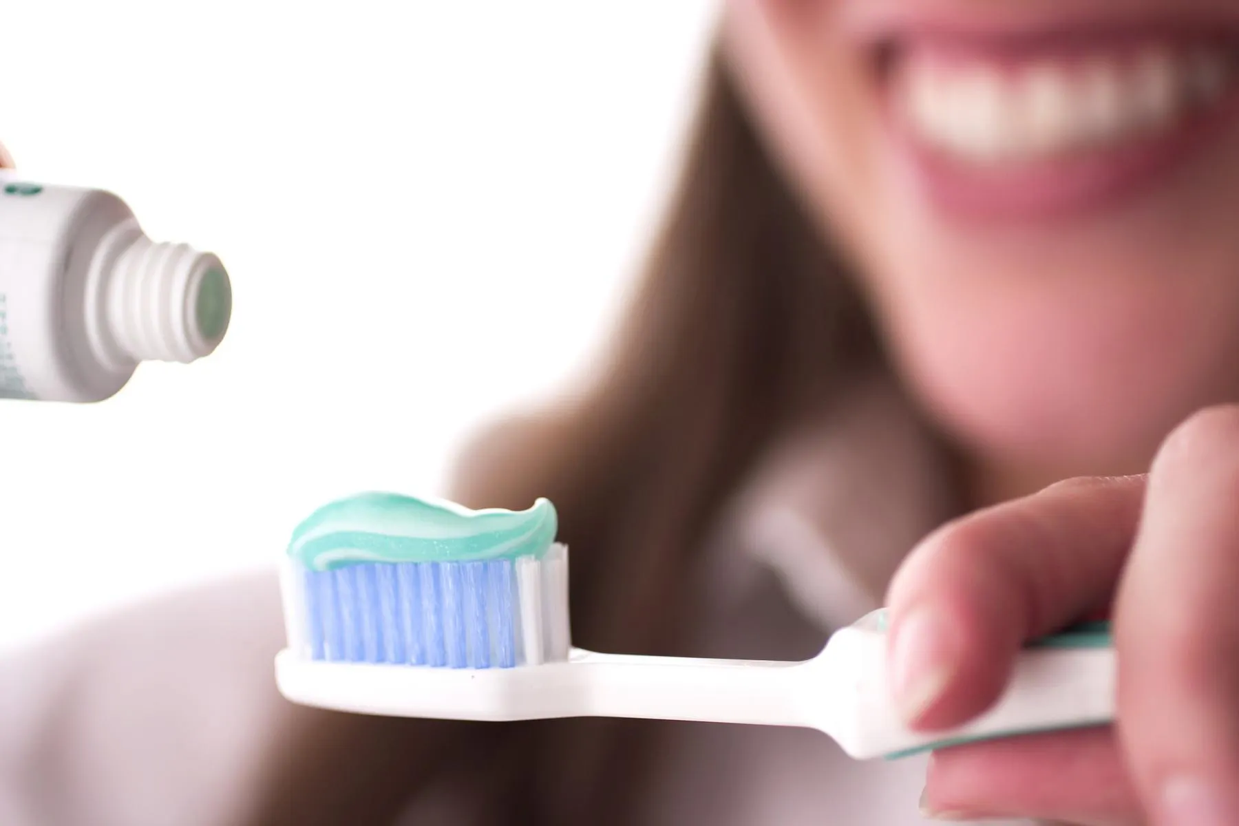 Why do my gums hurt when I brush?