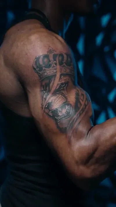 Published crowned-lion tattoo showcase