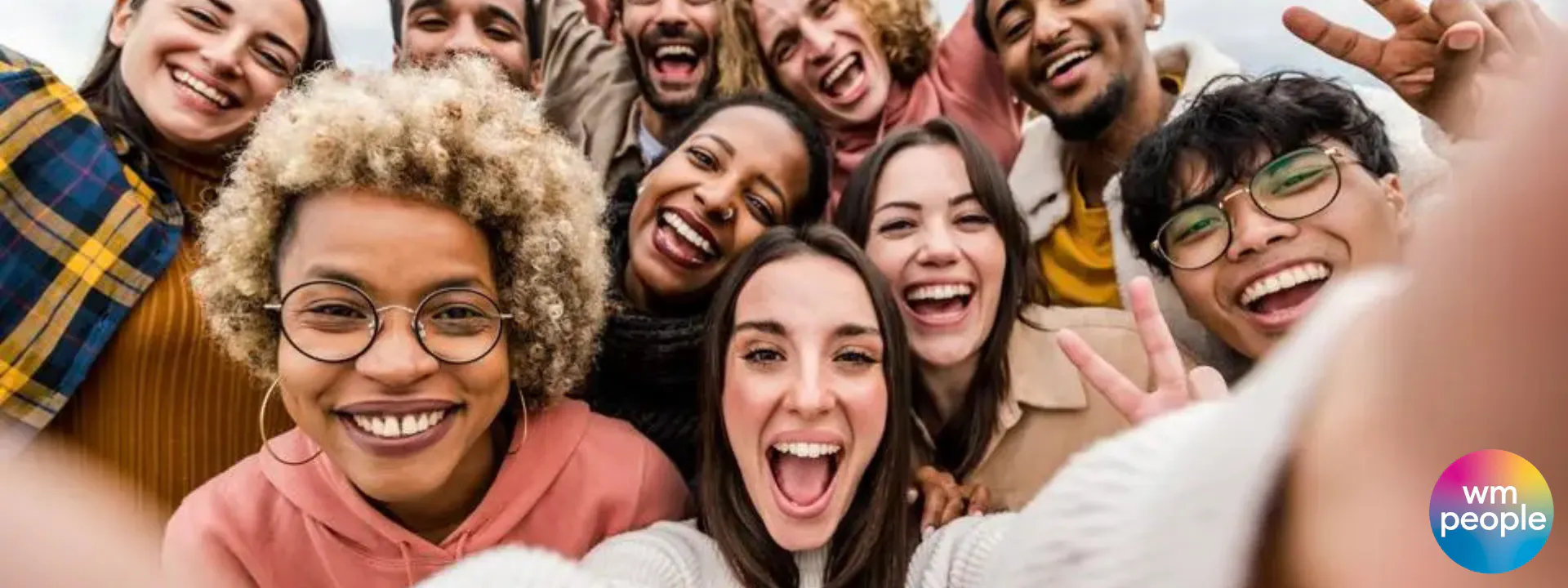 Group selfie with multigenerational and racial people