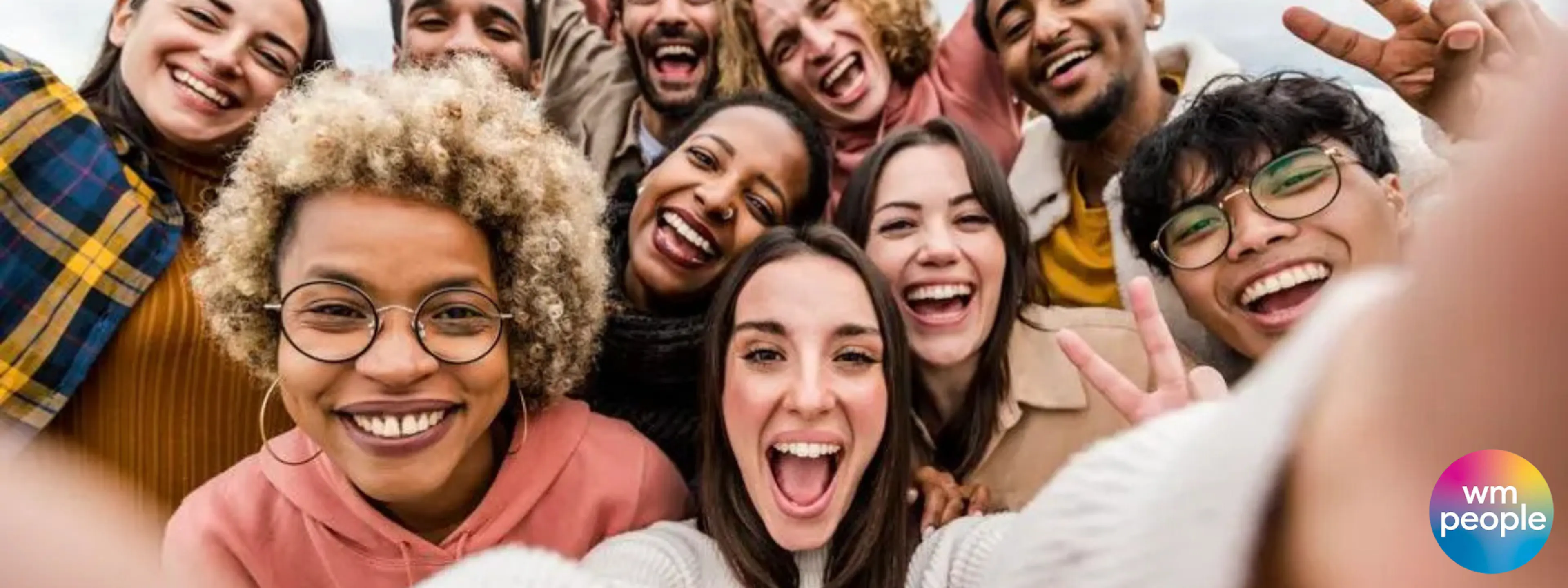 Group selfie with multigenerational and racial people