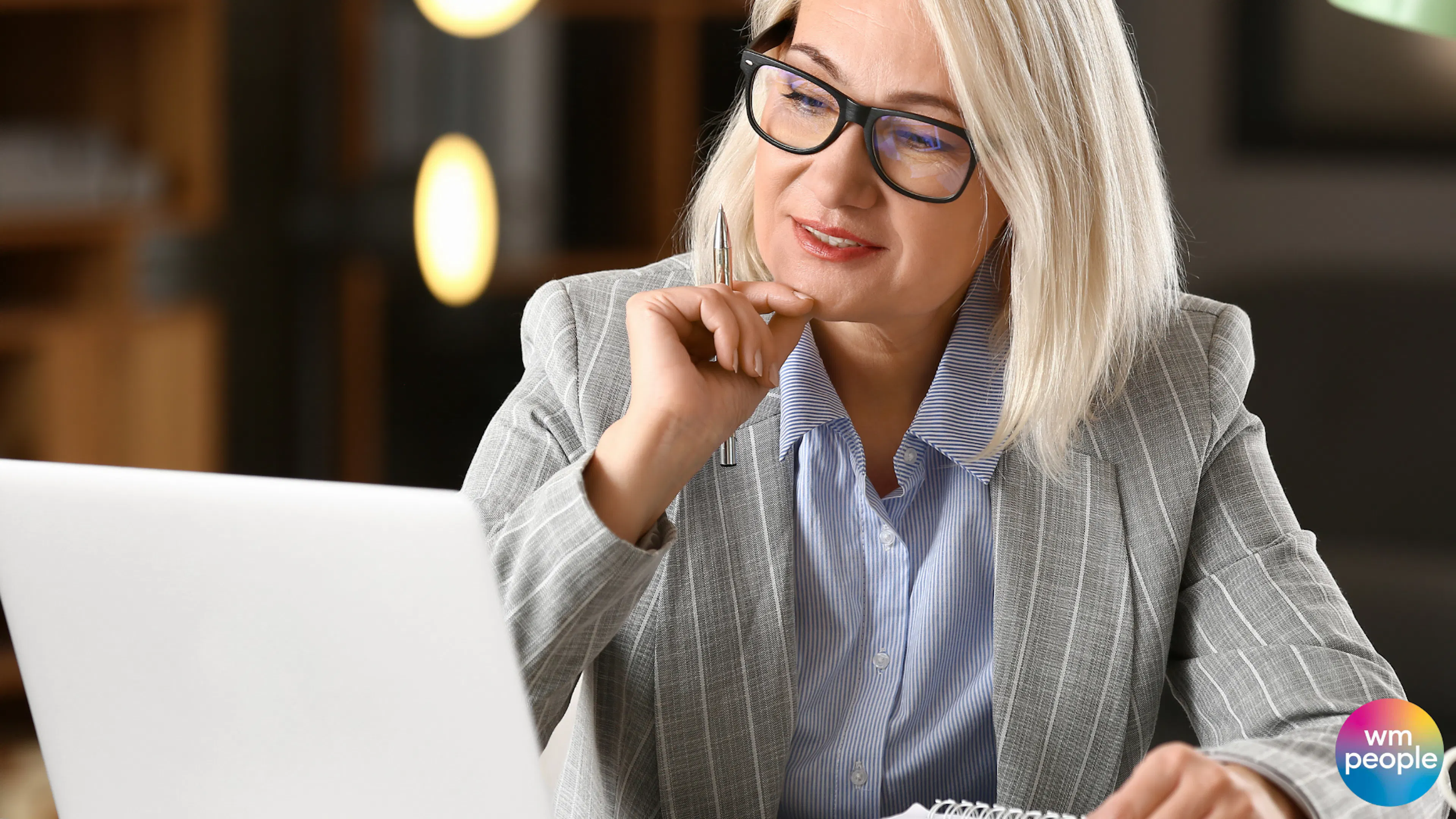 female looking at a computer