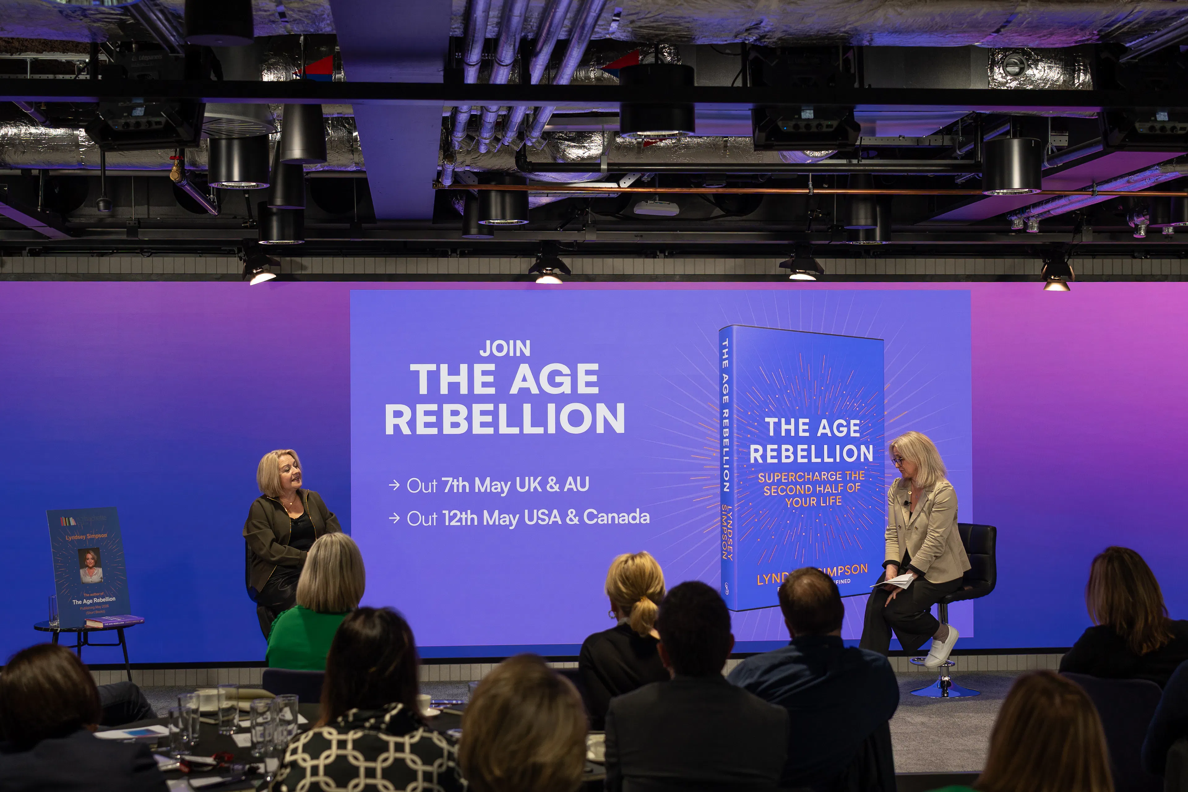 Lyndsey and Jo are discussing The Age Rebellion on stage.