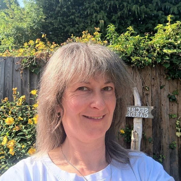 Headshot female with garden background