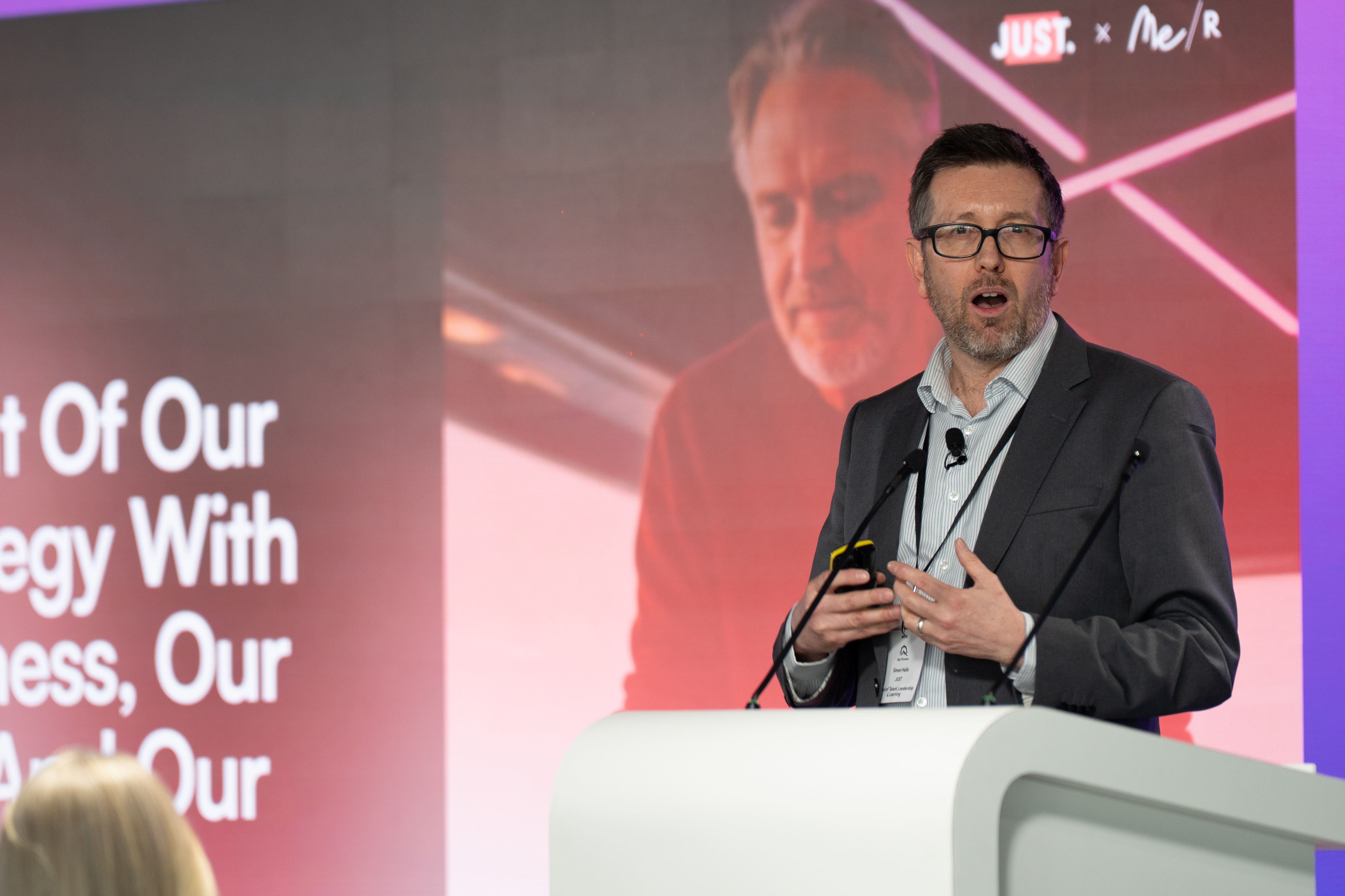 Simon addresses the audience at Age Pioneers