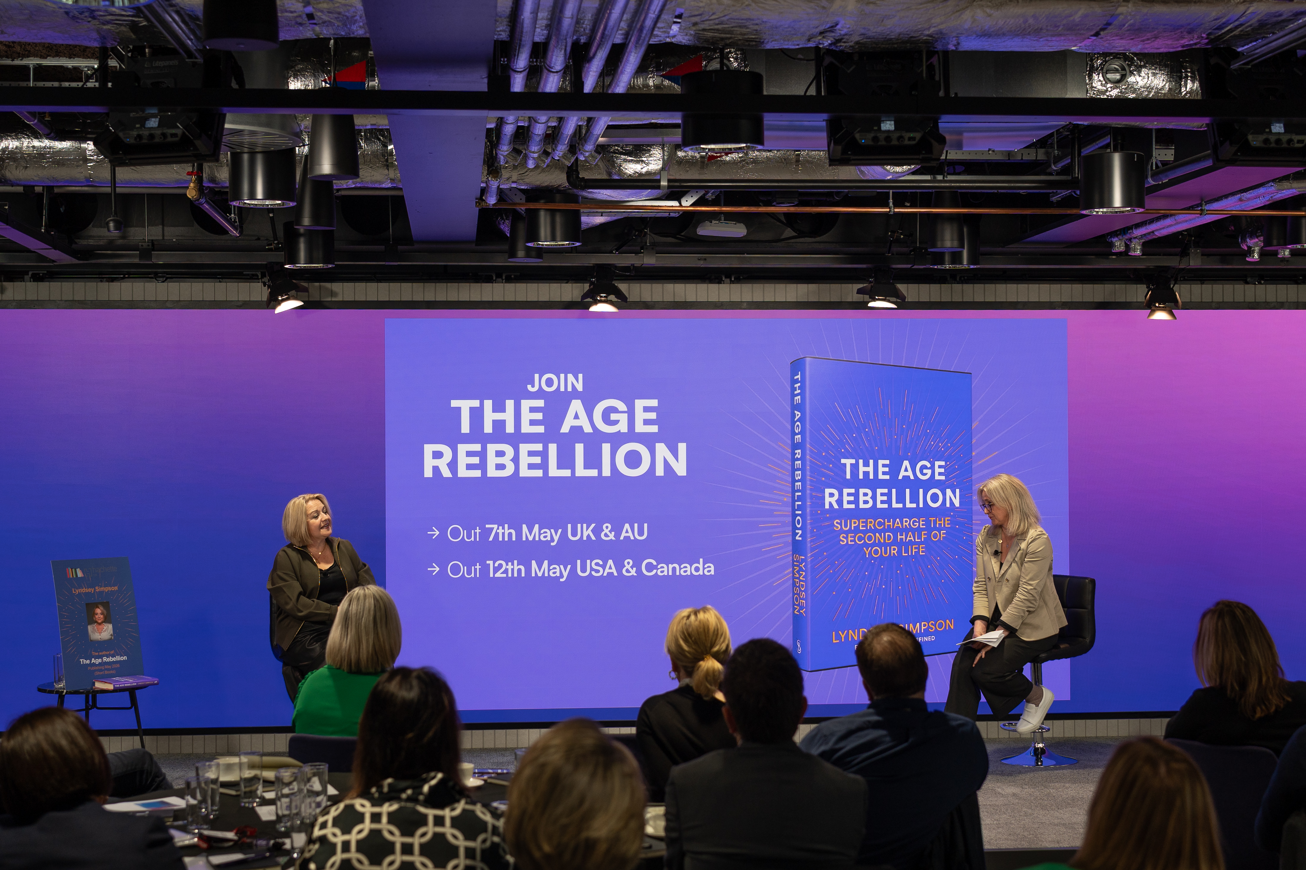 Lyndsey and Jo are discussing The Age Rebellion on stage.