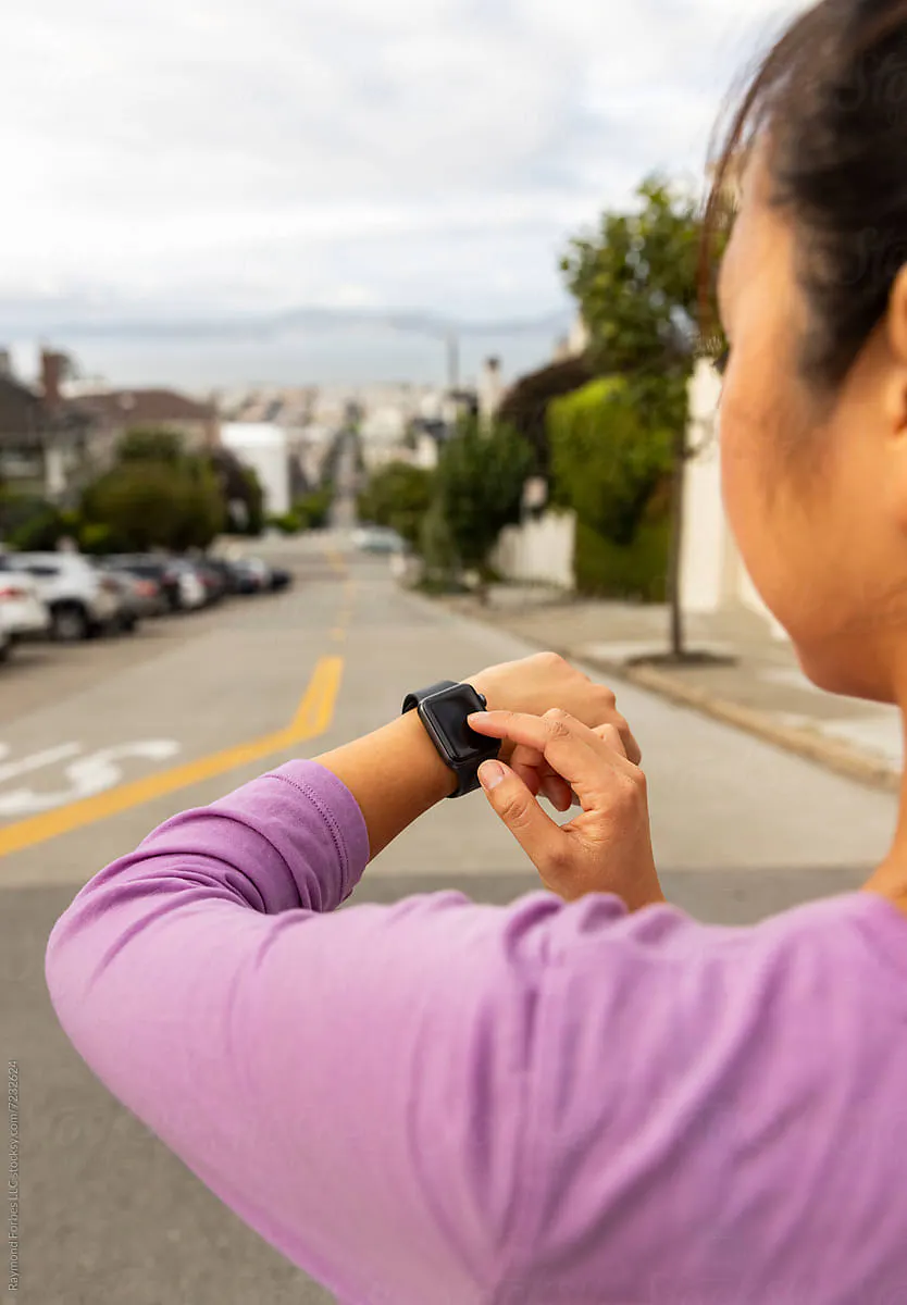 Person using a wearable device during outdoor activity