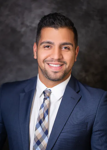 Dr. Mohammad Pourmandi smiling in a professional portrait