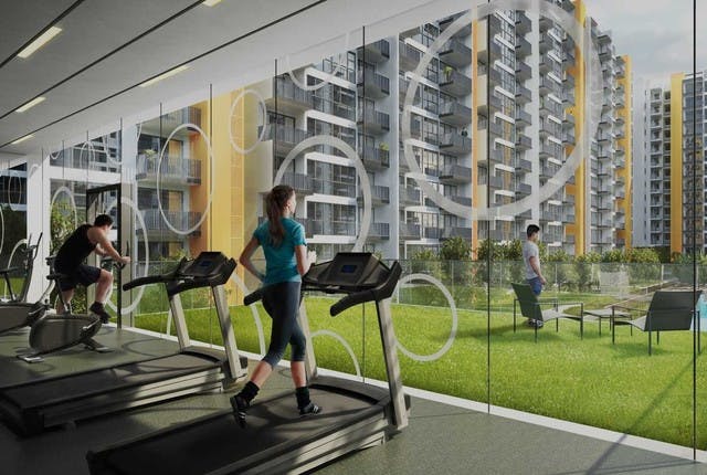 Floor to ceiling glass windows in the indoor gym