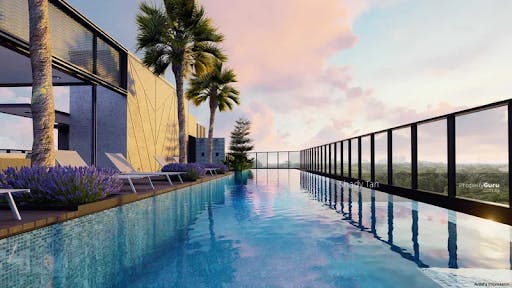 A picturesque rooftop pool atop MORI condo is depicted with lilac-tinted clouds. 