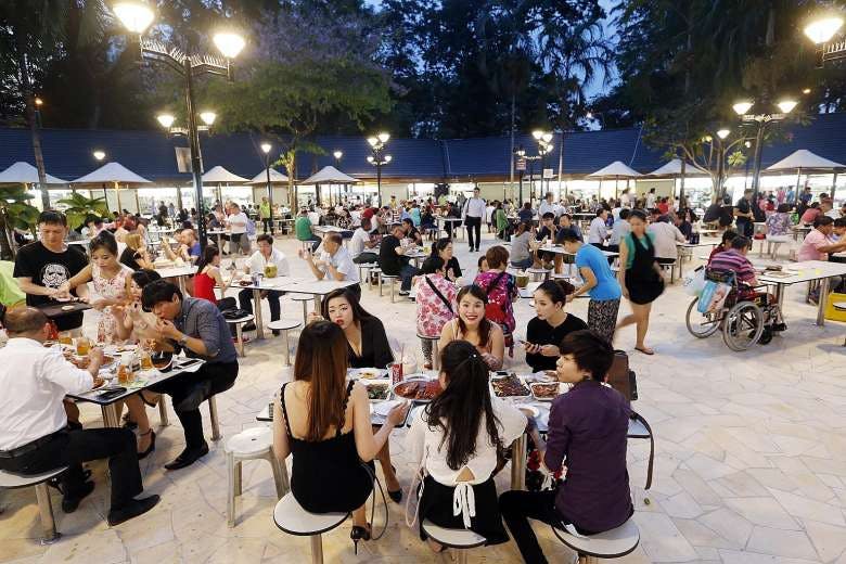Diners enjoying their meals at Newton Food Centre