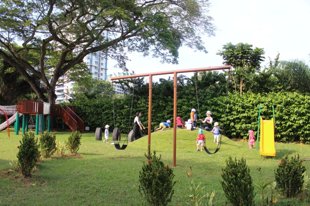 Children from EtonHouse Mountbatten 717 playing in its Outdoor Playground