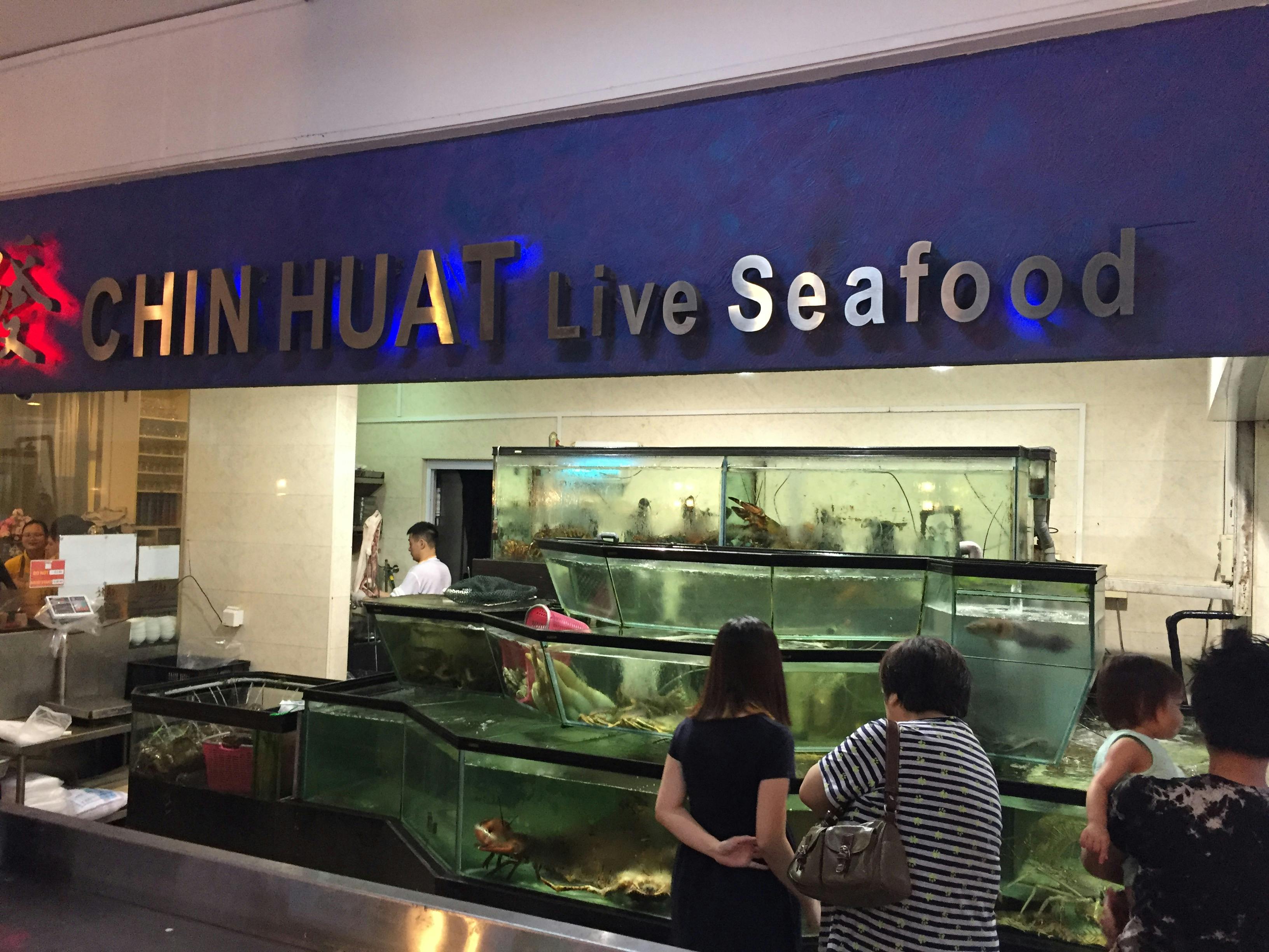 Diners chosing their catch from the tanks at Chin Huat Live Seafood