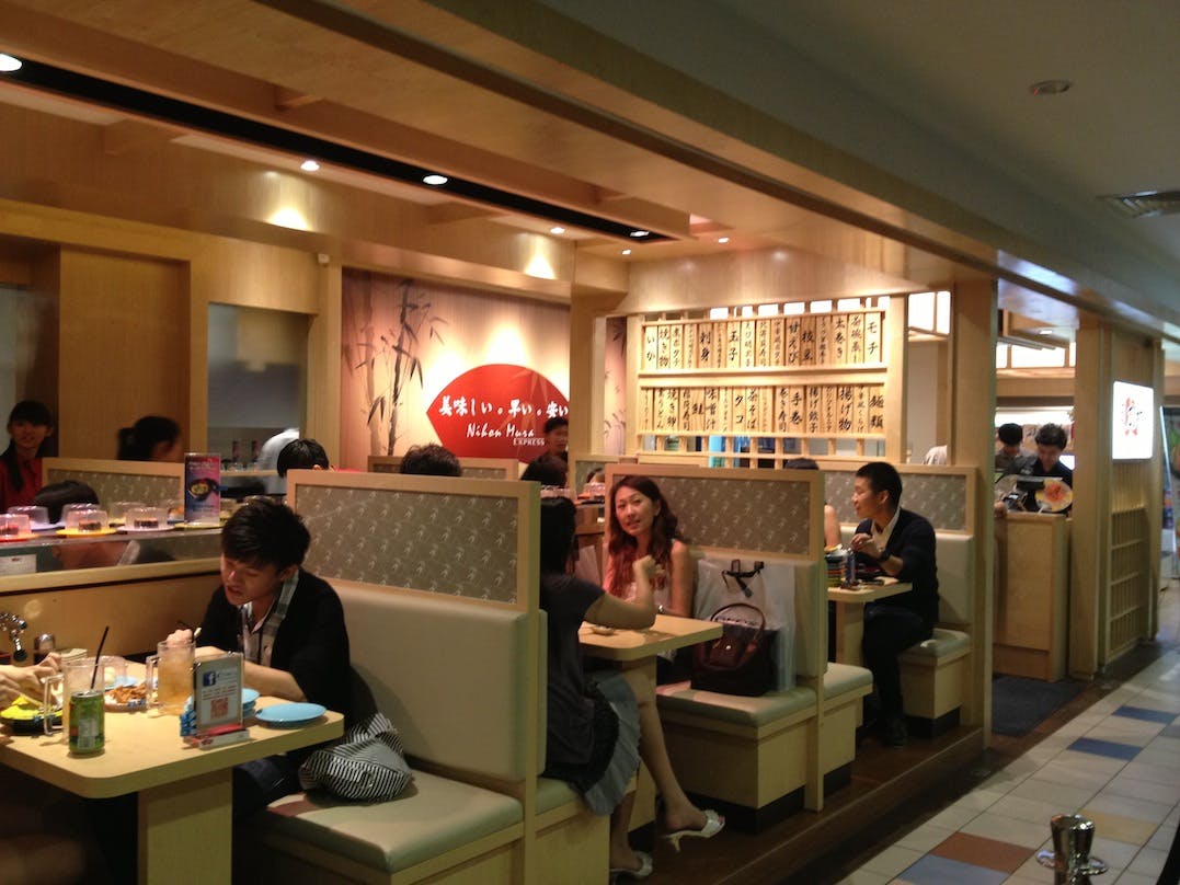 Diners enjoying their meals at Nihon Mura Express