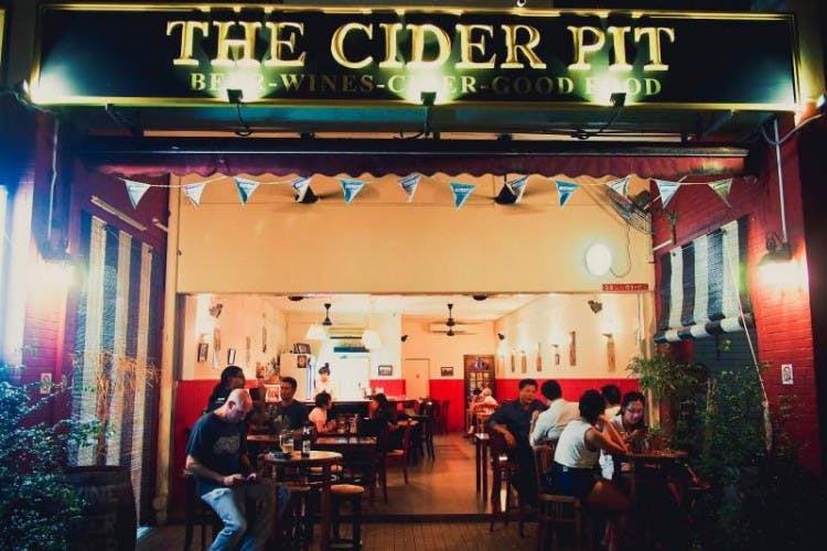 People lounge at The Cider Pit
