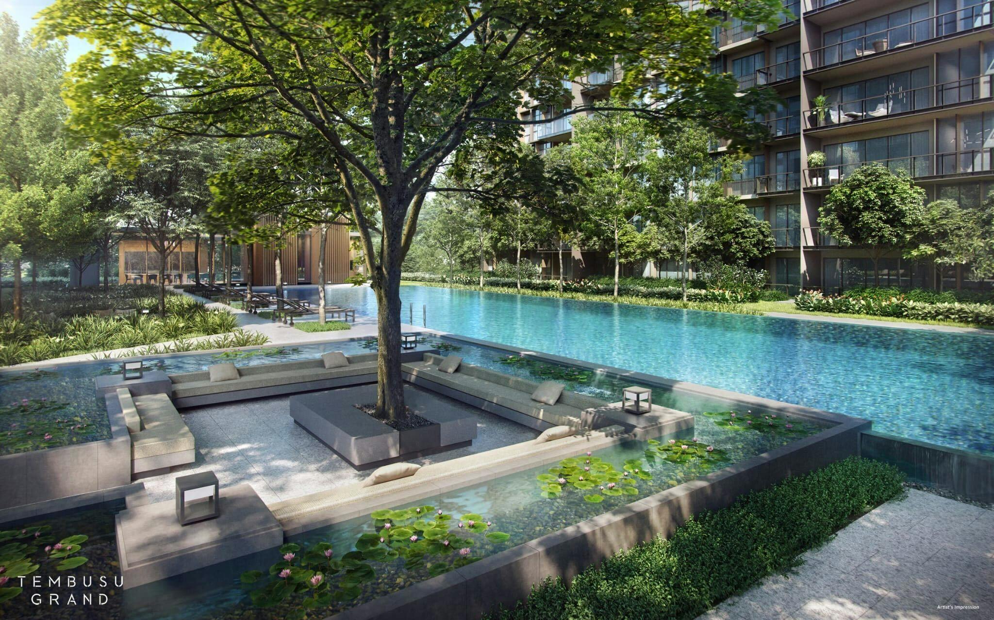 Outdoor lounging area by the swimming pool in Tembusu Grand