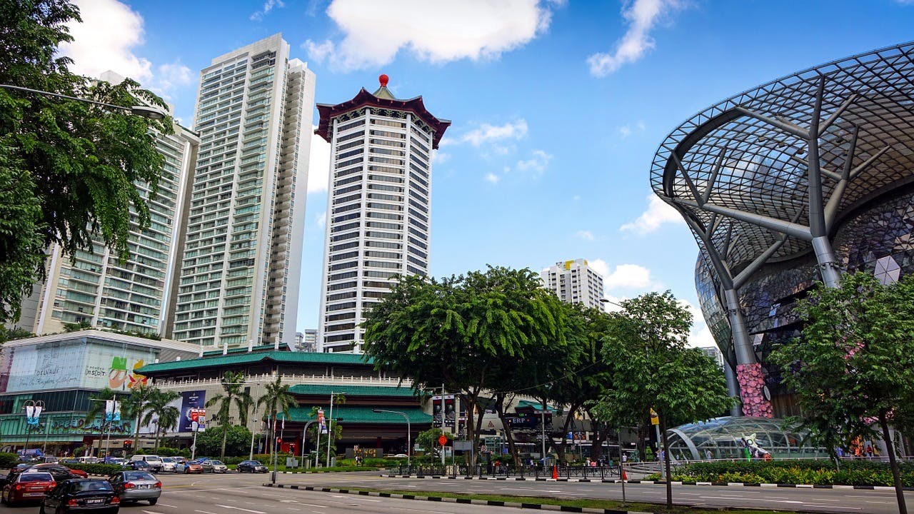 Road junction at Orchard Road showing Tang Plaza and Ion Orchard