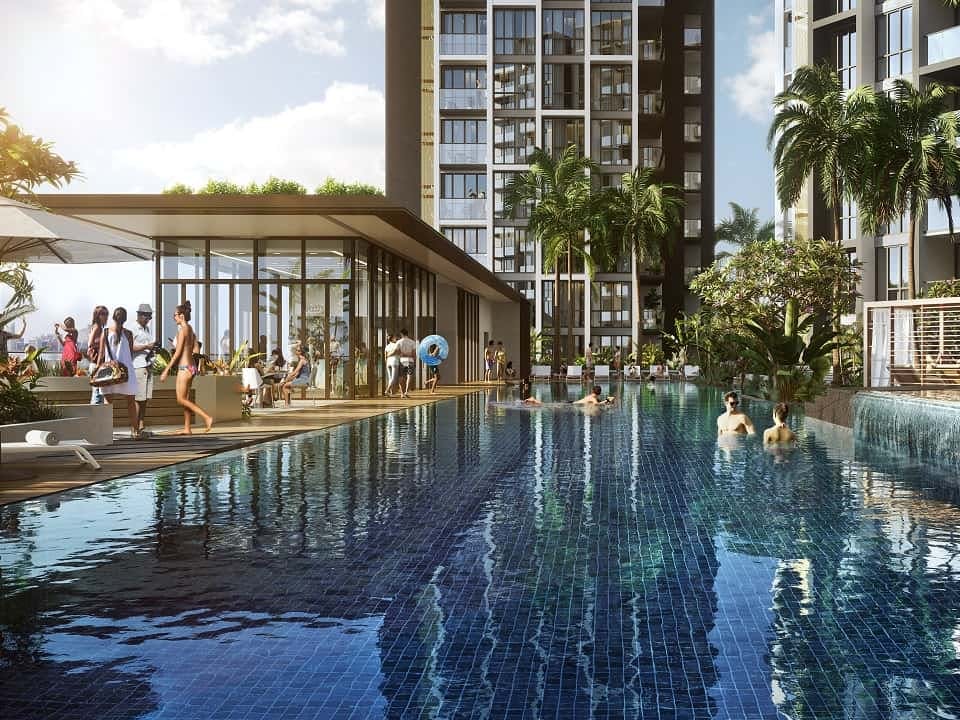 Lush greenery surrounds the luxurious pools at Park Place Residences.