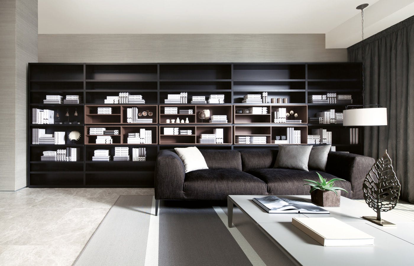 The sleek, posh, and simplistic black-themed interior of a home at 19 Nassim.