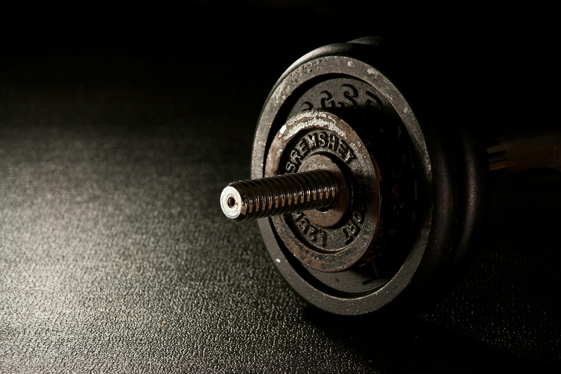 Weights attached to a bar bell taht can be found in many gyms around the Tanjong Pagar Neighbourhood