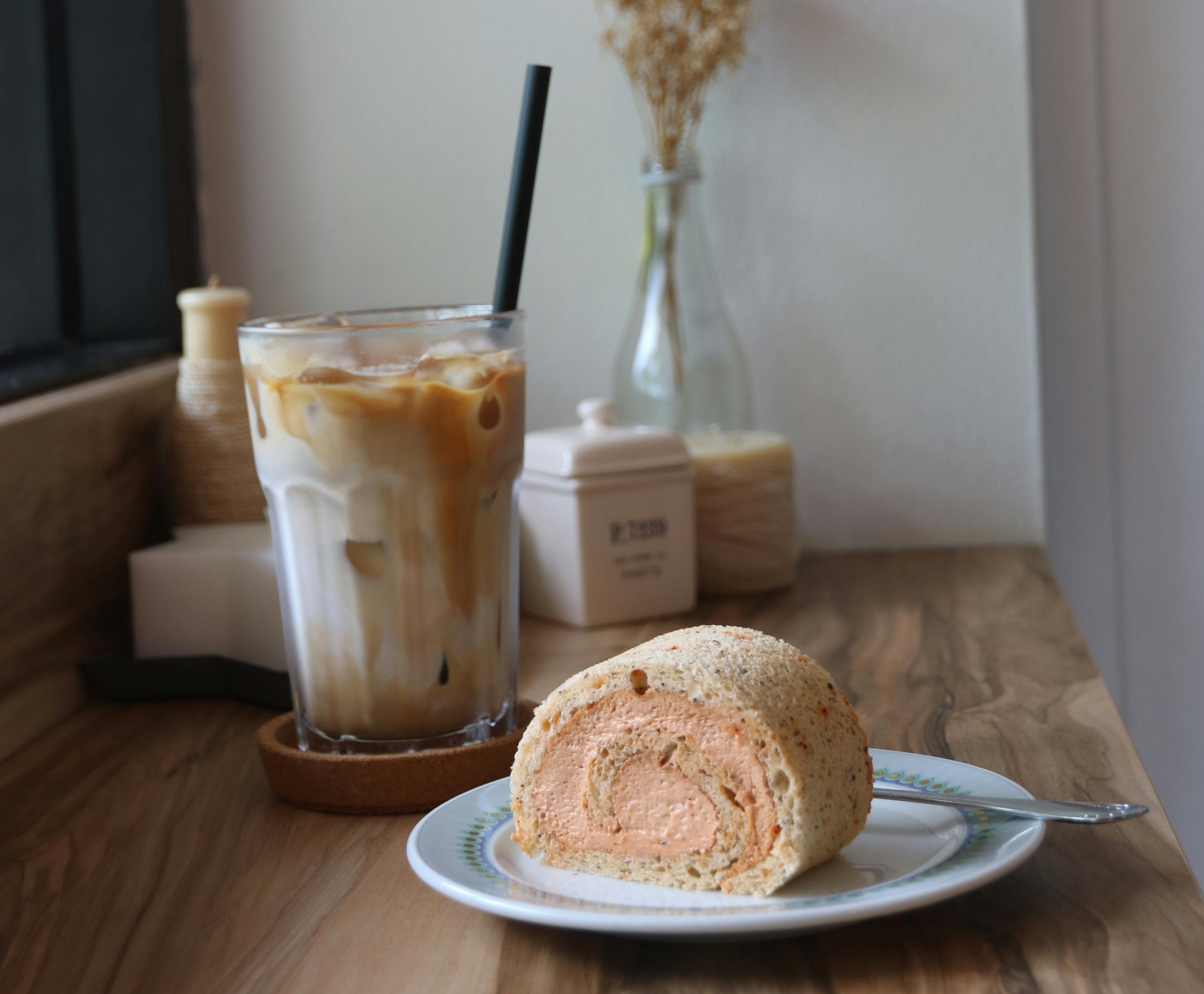 Coffee and a swiss roll from The Plain Jane Cafe