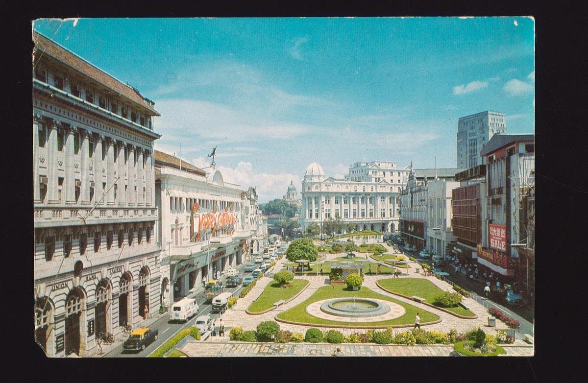 A photograph of Raffles Place Park in the mid-late 1960s.