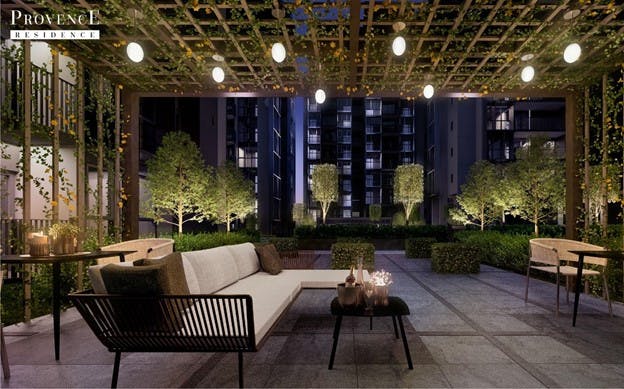 Artist's Impression captures the gorgeous night time view of a lush communal seating area in Provence Residence EC.