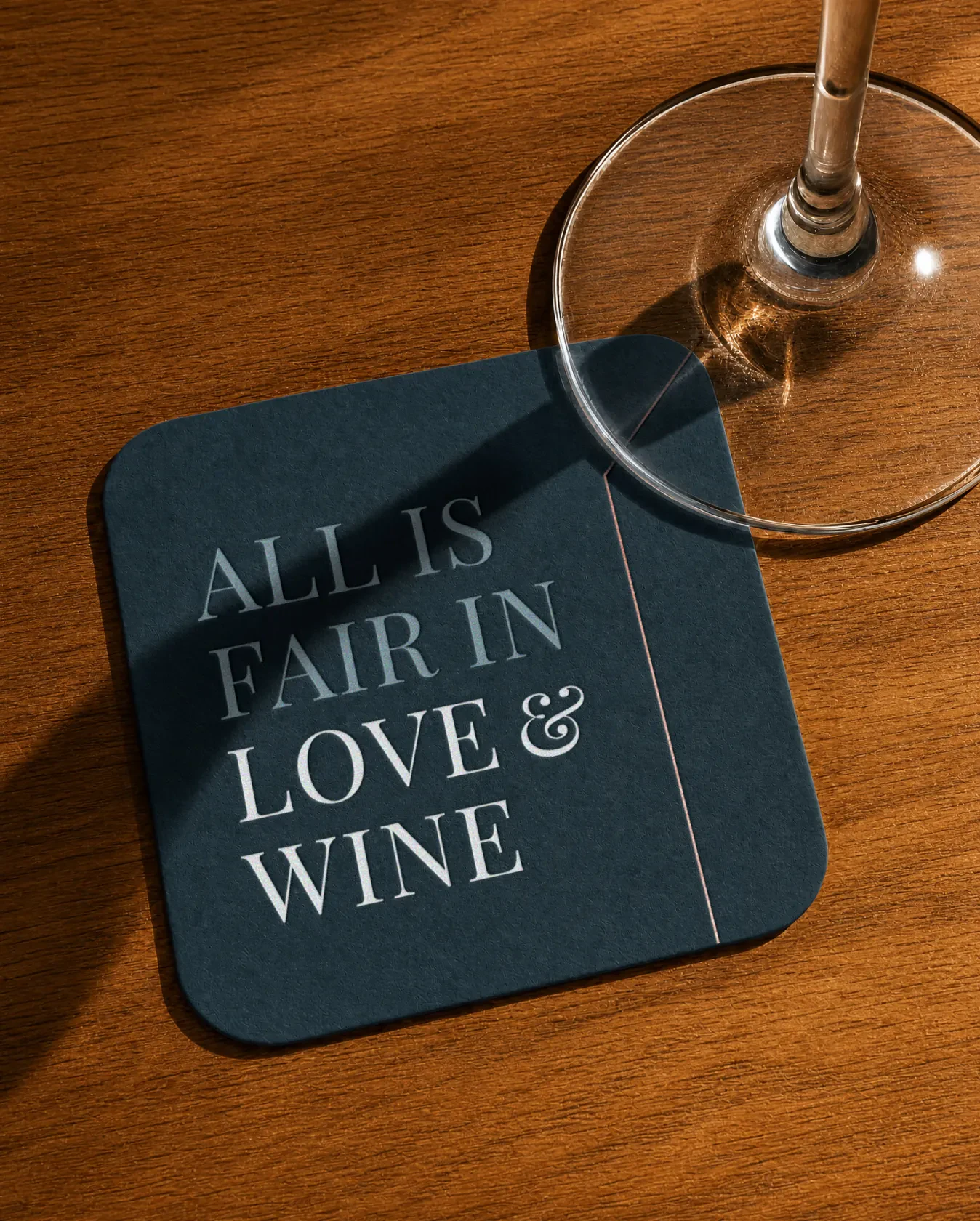 Door hanger and cards on a table beside a wine glass