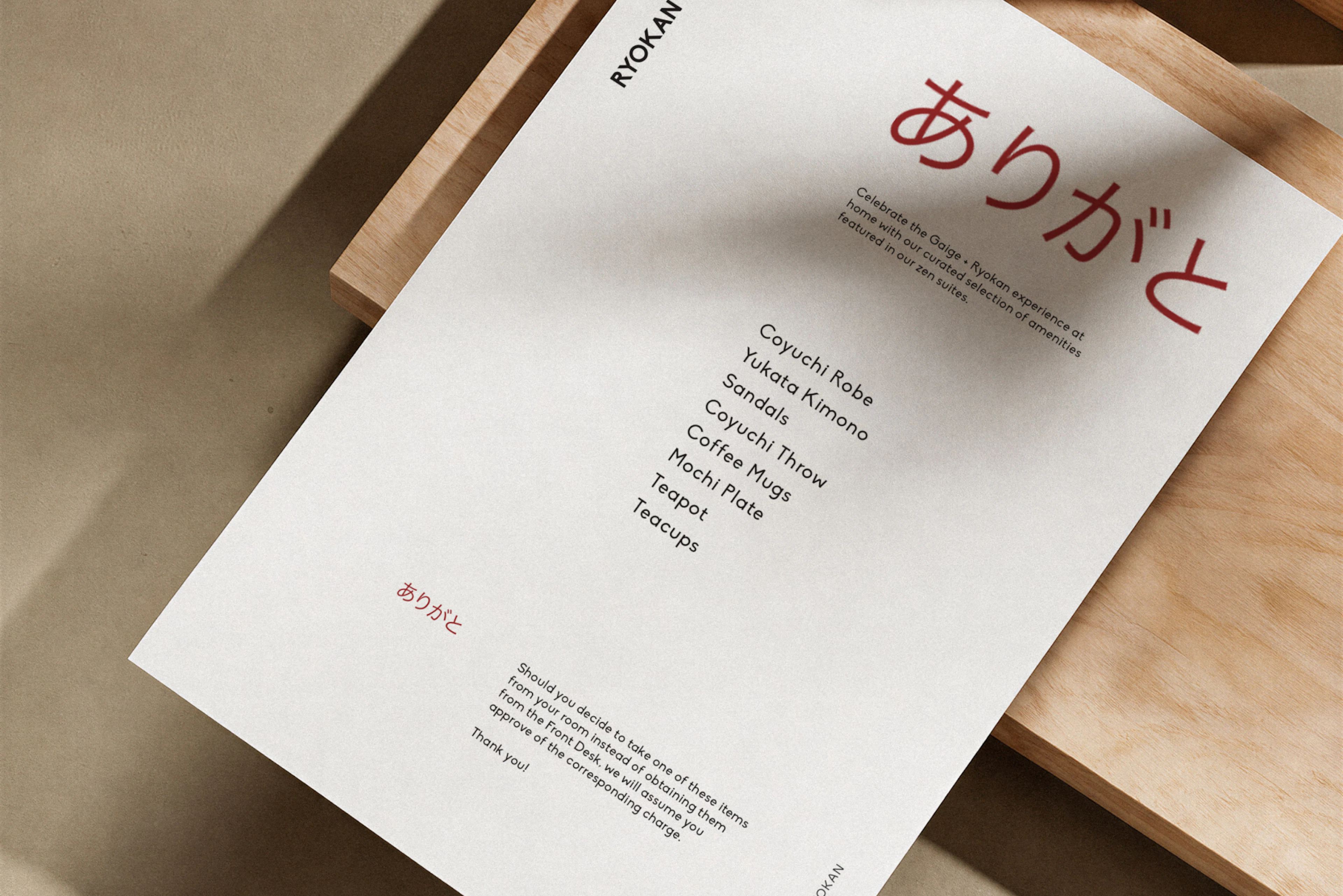A menu card on a letter sized paper sitting on top of a wood table