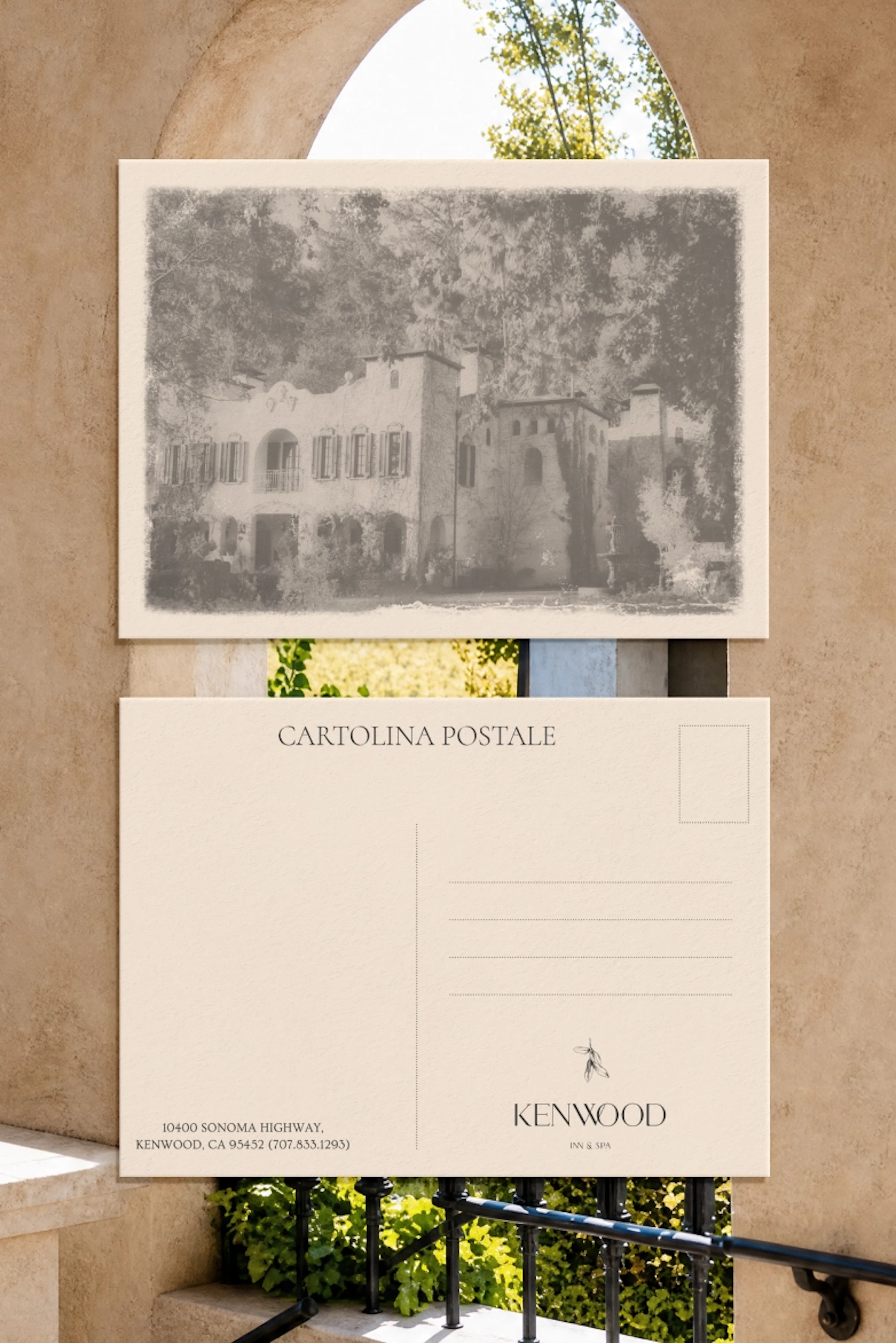 Kenwood Inn & Spa postcard mockup against stone archway