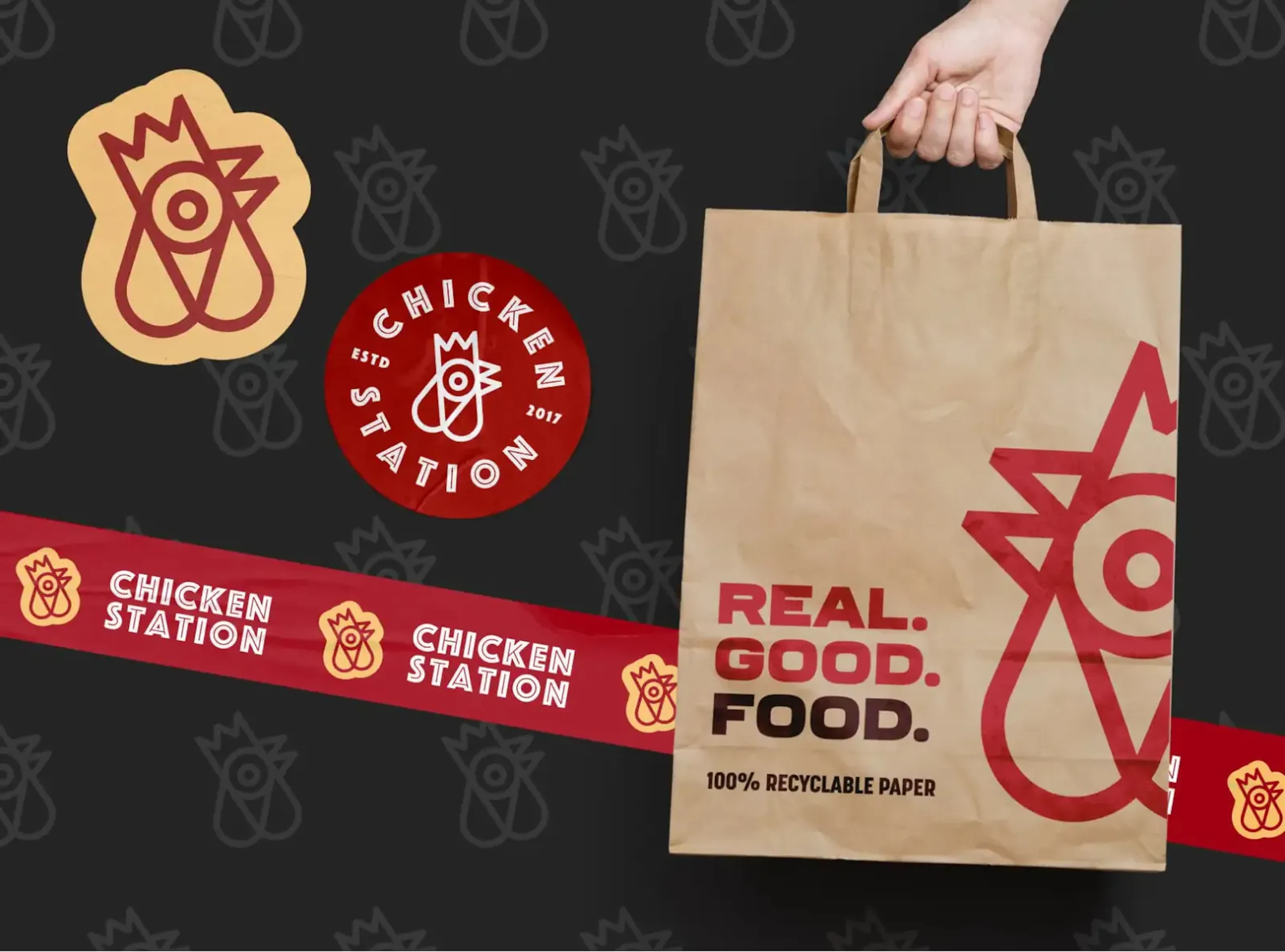 Chicken Station branded stickers, tape, and paper takeout bag